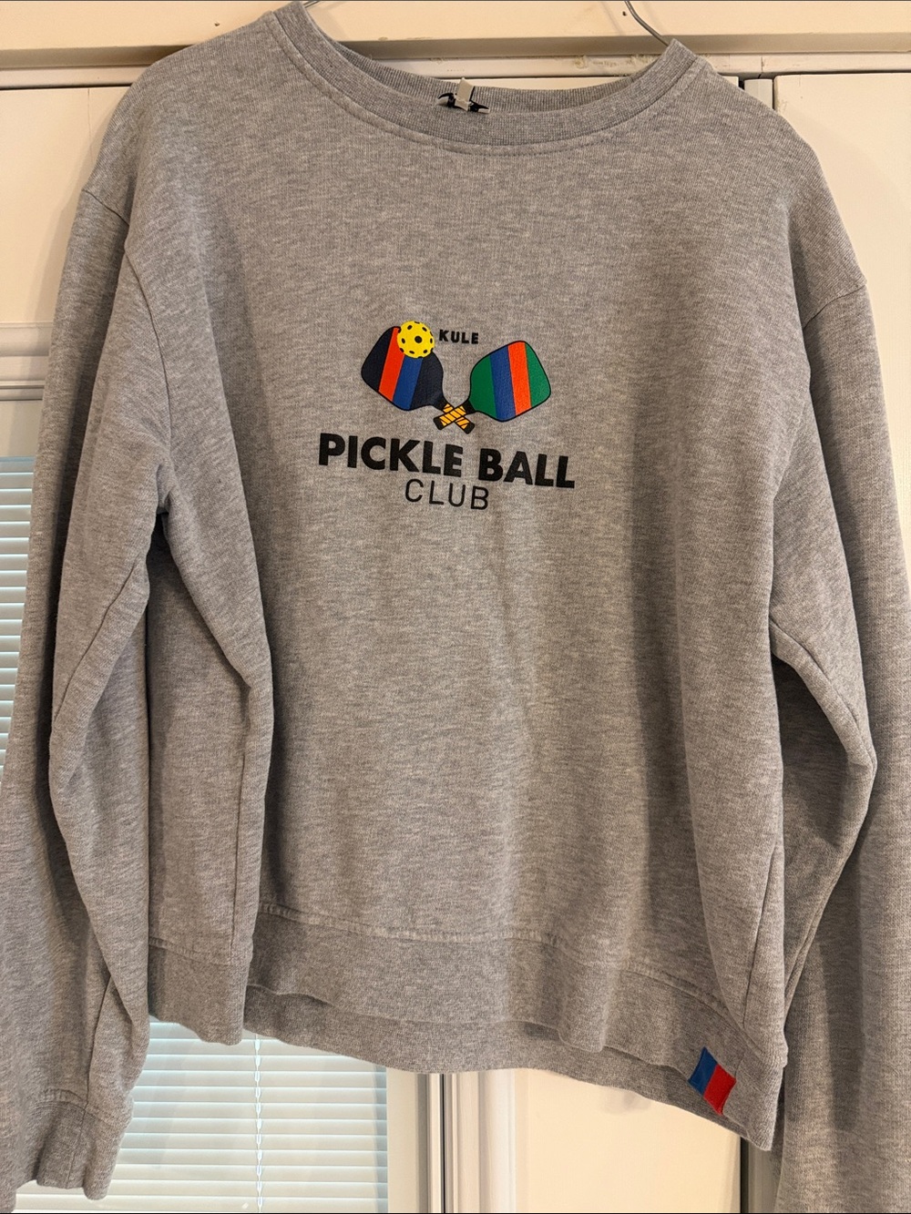 KULE Gray Pickleball Club Crewneck with Multicolor Paddle Graphic